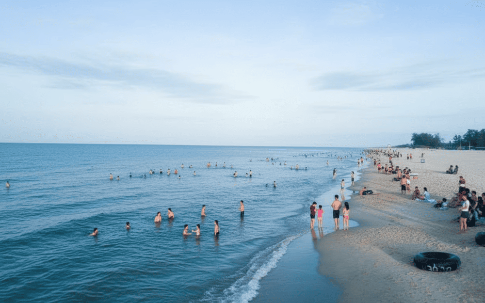 Swimming at Thuan An beach offers a refreshing escape in calm, clear waters, surrounded by the tranquil beauty of central Vietnam&rsquo;s coastline